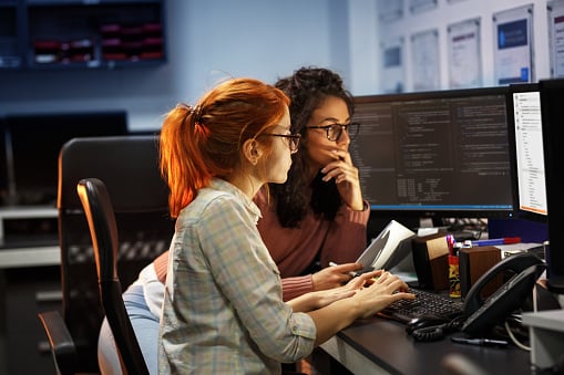 Two software engineers pair coding